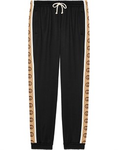 Спортивные брюки с логотипом на лампасах Gucci