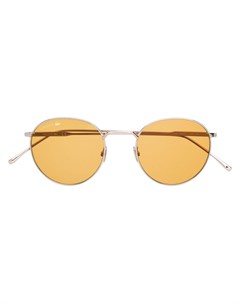 Солнцезащитные очки в круглой оправе Lacoste