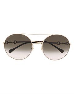 Солнцезащитные очки в круглой оправе с декором Horsebit Gucci eyewear