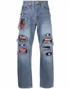 Узкие джинсы с эффектом потертости Doublet