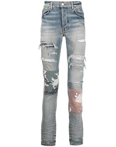 Узкие джинсы с эффектом потертости Amiri